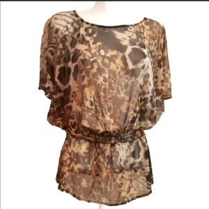 Sheer top. Fits size small-medium